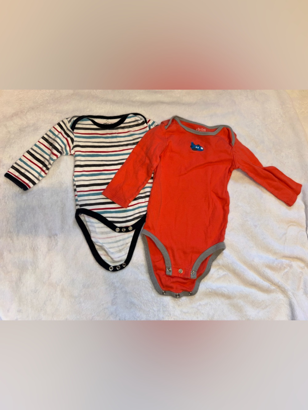 Orange as well as a striped. Long-Sleeved baby onesies